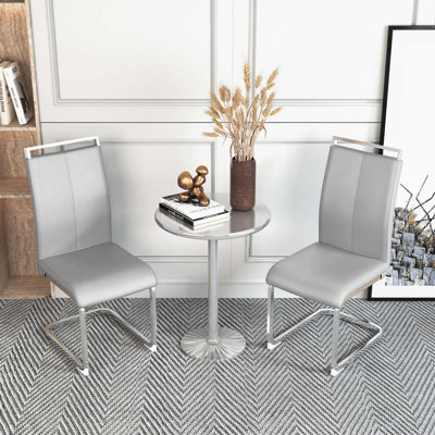 Chaises de salle à manger modernes, chaise d'appoint rembourrée en similicuir à haut dossier en polyuréthane avec pieds en métal chromé en forme de C pour la salle à manger, chaise de bureau, meuble-lavabo et patio (ensemble de 2) (gris clair + pol