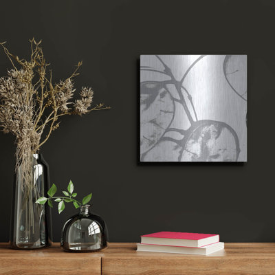 «Silver Dollars 1» par Erin Clark, art mural en métal