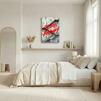 Ensemble d'une toile murale « Grimpez quand même ».
