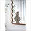 Miroir arqué en bois avec cadre unique