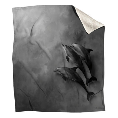 Three Swimming Dolphins Blankets