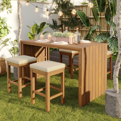Ensemble de bar extérieur 5 pièces, table de bar en bois d'acacia de patio et quatre tabourets avec coussins, ensemble de bar de salle à manger en bois pour la cour, le bord de la piscine, le balcon, beige