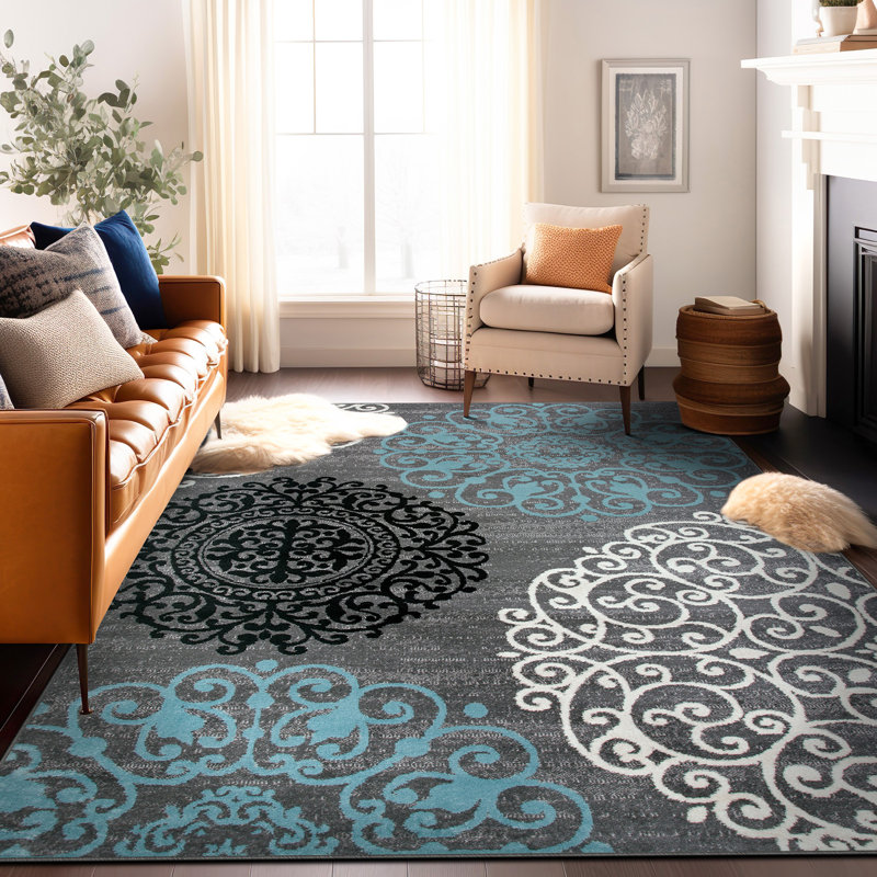 Tapis gris / bleu / noir à motif floral Padowski