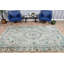 Grand tapis turc fait à la main avec un design antique et des teintes vertes, idéal pour la décoration intérieure