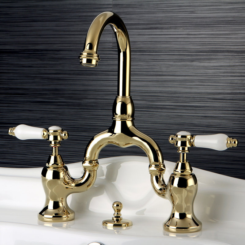 Kingston Brass Bel-Air Two-Handle 3-Hole Deck Mount Bridge Bathroom Faucet with Brass Pop-Up, Polished Brass