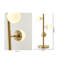 Lampe de table 3 lumières dorées avec abat-jour en forme de globe blanc