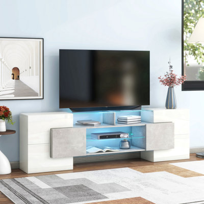 Meuble télé Shape avec 2 tablettes en verre illuminées, centre de divertissement gris ultrabrillant, peut accueillir des téléviseurs de 88 po ou moins, lumières DEL à changement de couleur, salon