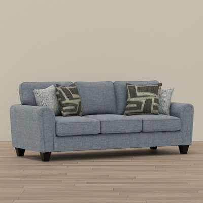 Soft Blue Upholstered Sofa with Pillows