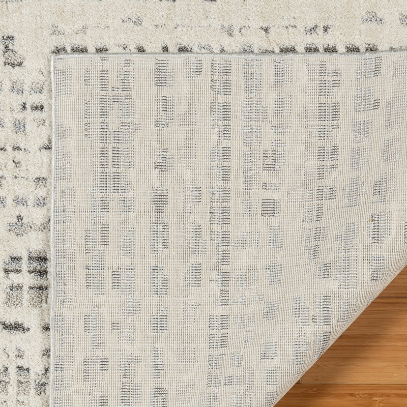Ivory and Gray Tufted Polka Dot 5' x 7' Synthetic Rug