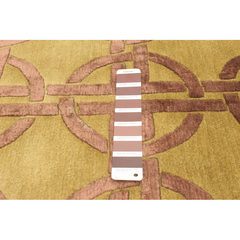 Tapis jaune noué à la main à motif géométrique Checotah