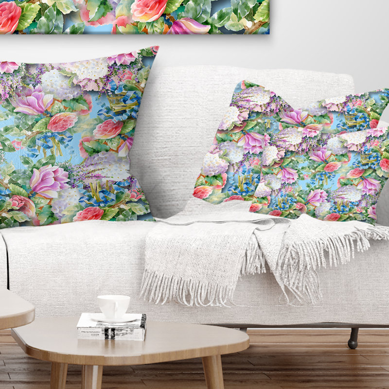 Motif de fleurs roses sur fond bleu - coussin à imprimé floral