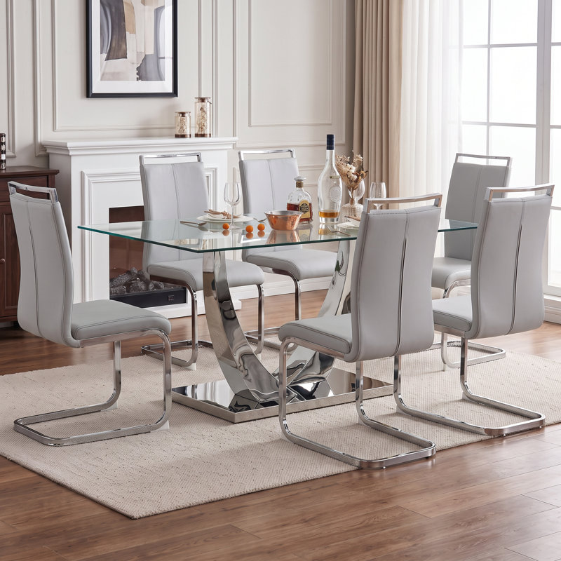 Ensemble de salle à manger rectangulaire moderne en verre trempé de 63 po avec base en métal et chaises en porte-à-faux en similicuir