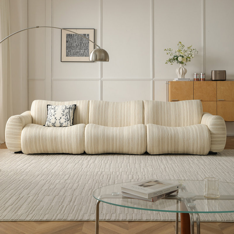 Canapé bas moderne et minimaliste de 110 pouces, recouvert de tissu texturé.
