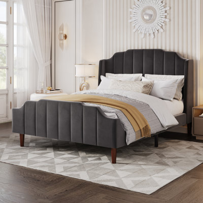 Malalia Upholstered Wingback Bed