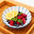 Blue petal-shaped fruit bowl with stand