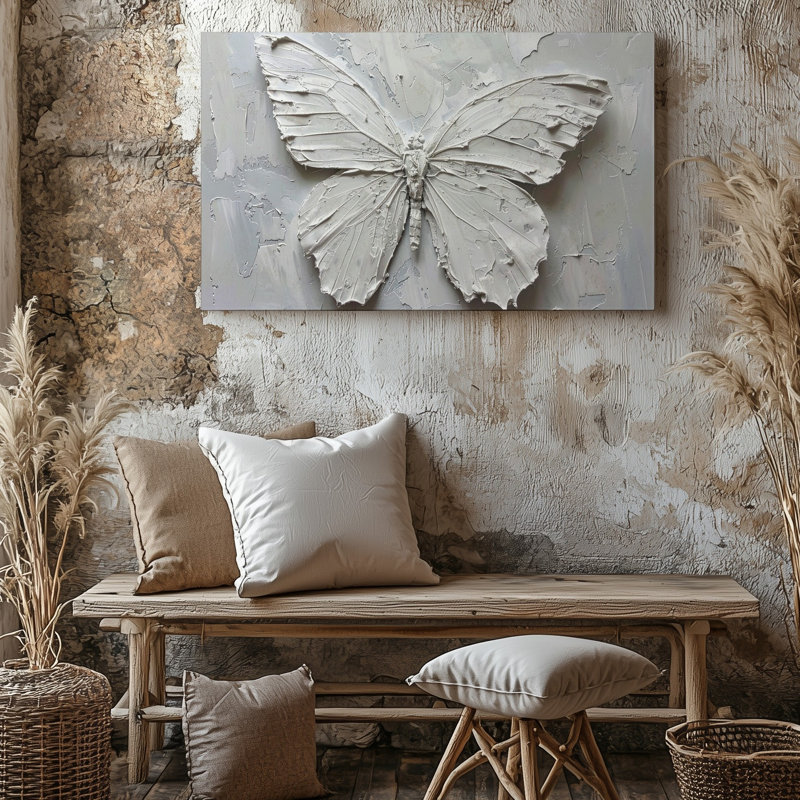 Reproduction d'art monochrome sur toile texturée d'un papillon sculpté à partir de couches épaisses de peinture blanche sur toile