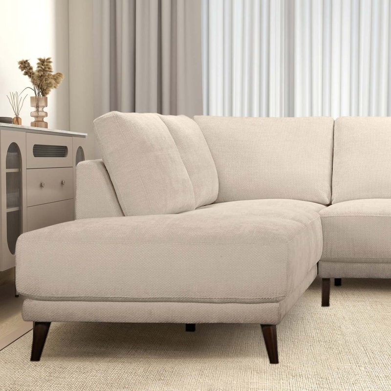 Canapé modulaire crème avec repose-pieds