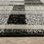 Tapis noir / ivoire à motif géométrique Torge-1382795753
