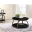 Table basse ronde gris foncé et nickel noir