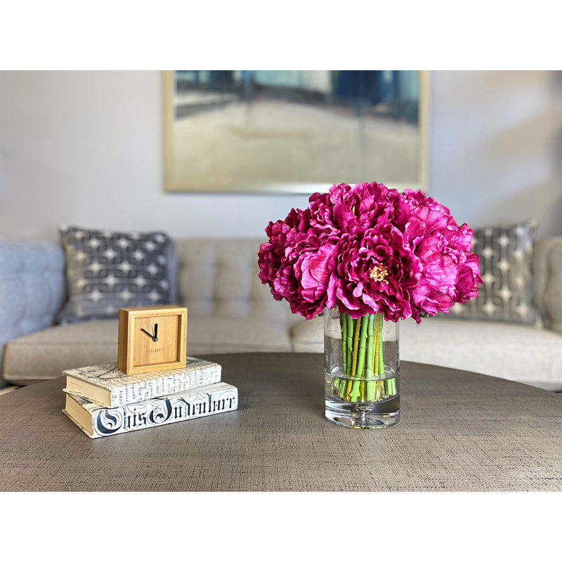 Peony Floral Arrangement In A Cylindrical Glass Vase