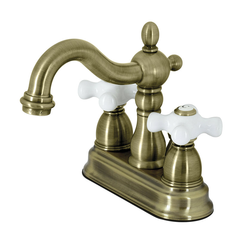 Kingston Brass Heritage Two-Handle 3-Hole Deck Mount 4" Centerset Bathroom Faucet with Plastic Pop-Up, Vintage Brass