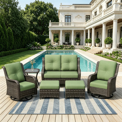 Ensemble de mobilier d'extérieur pour 4 personnes avec causeuse, chaises pivotantes, table d'appoint et coussin vert