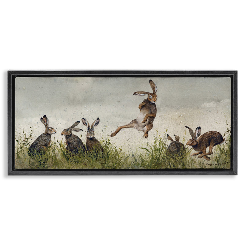 Jumping Hares in Wild Black Framed Floater Canvas Wall Art by Maggie Vandewalle, 11" H x 25" W, Jet Black Floater Frame