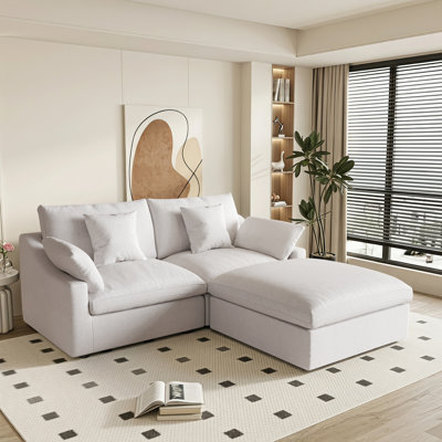 Slipcovered Upholstered Modular Sofa With Ottoman