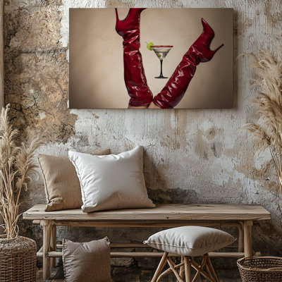 Toile d'une composition saisissante mettant en vedette une paire de bottes à talons hauts rouges lustrées élégamment posées sur une toile neutre neutre