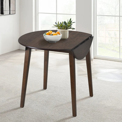 Layce Extendable Round Solid Wood Dining Table