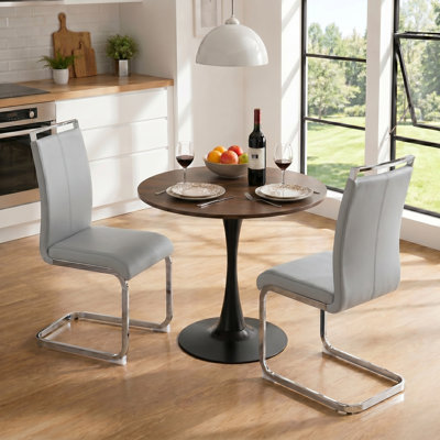 3-Piece Space-Saving Round Tulip Dining Set with Faux Leather Cantilever Chairs
