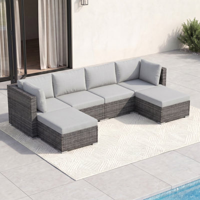 Ensemble de canapé modulaire d'extérieur en osier avec repose-pieds, ensemble de conversation à assise profonde avec coussins