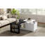 Table basse design à plateau relevable avec portes coulissantes de style grange et plateau pivotant, idéale pour des week-ends de détente à la maison. Décor moderne.