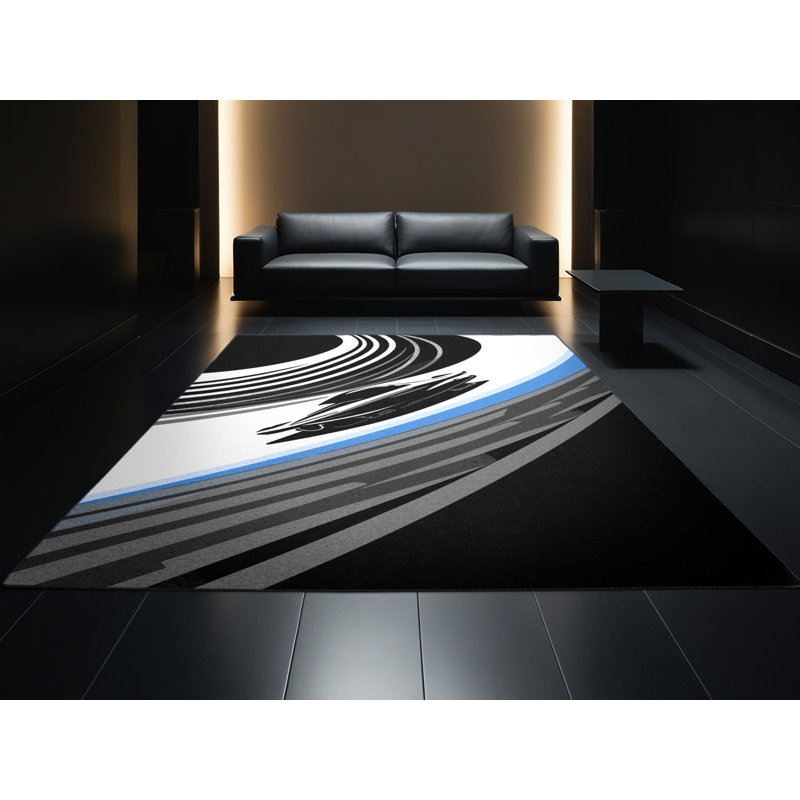 Tapis noir élégant et lavable à la machine Rayan Luge Race, 7 x 9