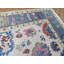 Tapis beige unique de 10 pi