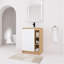 Meuble-lavabo autoportant de 24 po avec lavabo en céramique et porte à fermeture en douceur