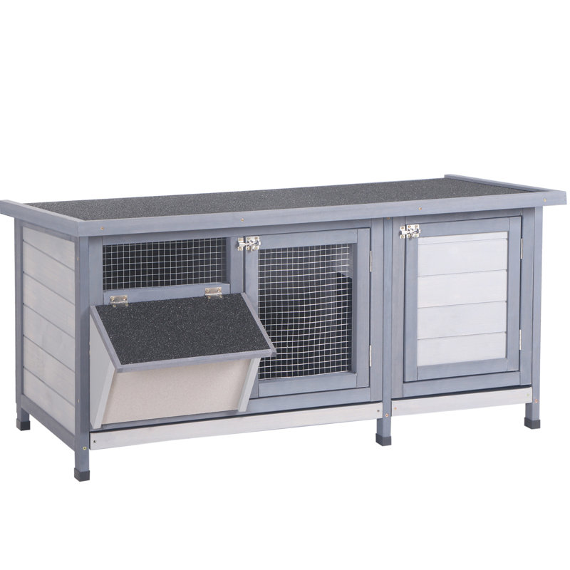 Chenil en bois gris avec toit imperméable