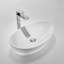 Lavabo de salle de bain ovale en porcelaine vitreuse avec trop-plein