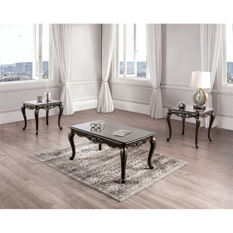 Table basse de style traditionnel avec pieds courbés et structure sculptée en bois massif