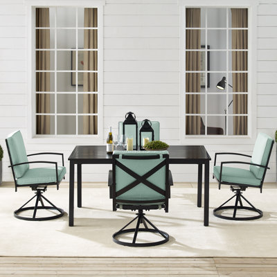 Halles 4 - Person Steel Patio Dining Set Umbrella Hole Included Rectangular Table with Cushions Included