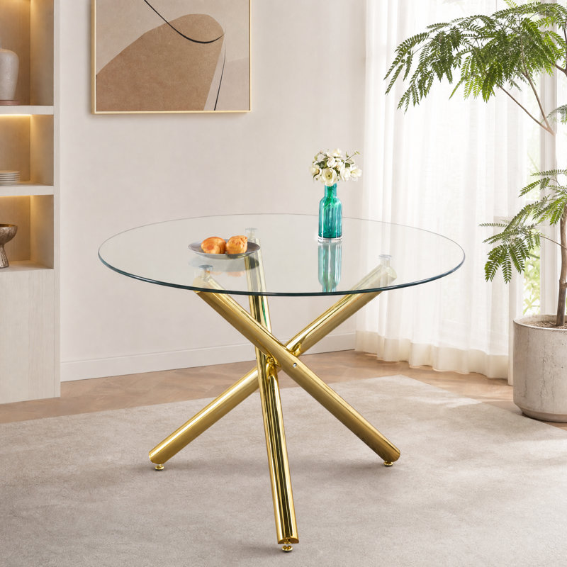 Table de salle à manger ronde moderne en verre avec base en métal doré