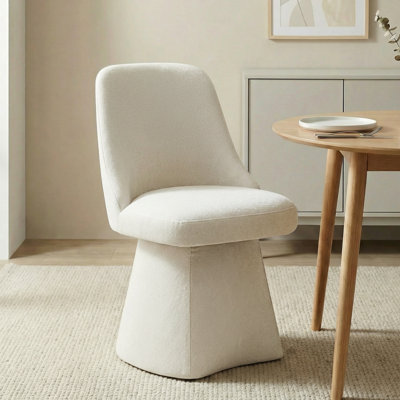 Chaise pivotante rembourrée en tissu