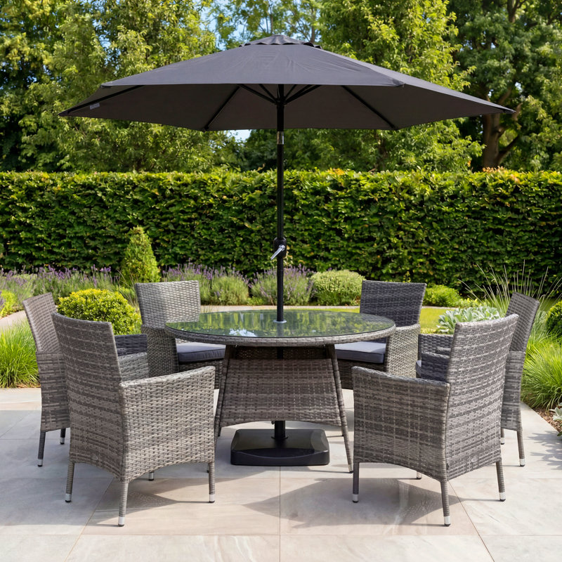 Jeneva 6 - Person Wicker Patio Dining Set with Round Table , Cushions Included, Grey