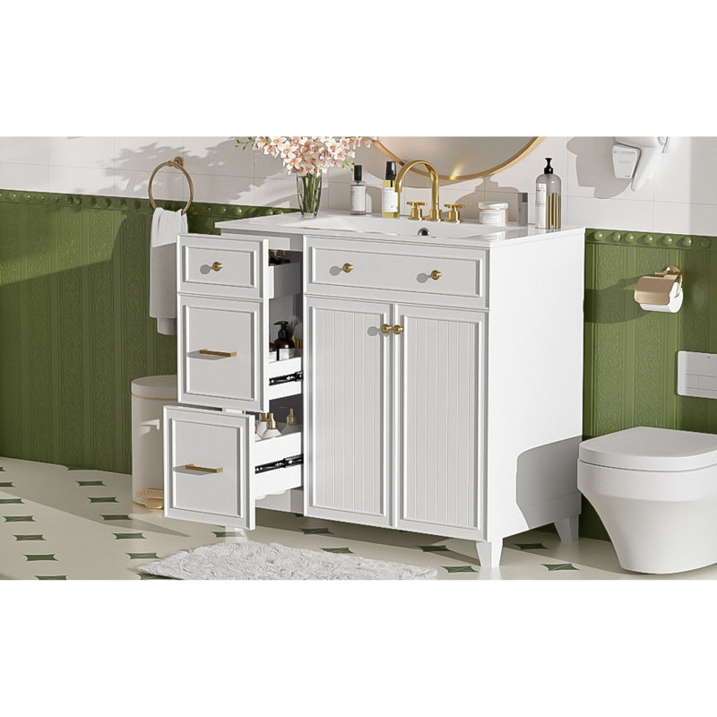 De salle de bain moderne avec lavabo en céramique, portes à fermeture douce, tablettes réglables et rangement intelligent pour les petits et moyens espaces