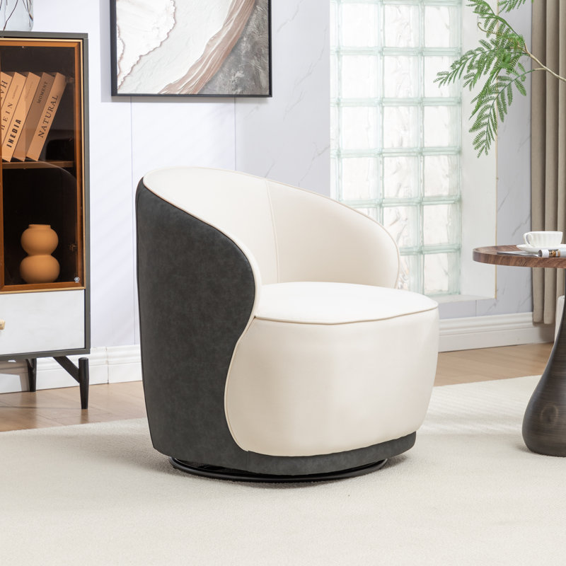 Fauteuil demi-tonneau pivotant en velours Stith,  Velours noir / beige
