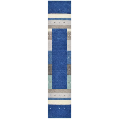 Hand Knotted Wool Area Rug in Blue/Brown/Gray/Ivory