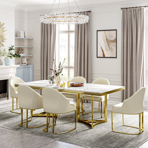 https://assets.wfcdn.com/im/7110912/resize-h600-w600%5Ecompr-r85/2424/242438297/Markhi+Marble+Dining+Table+with+White+Rectangular+Tabletop.jpg