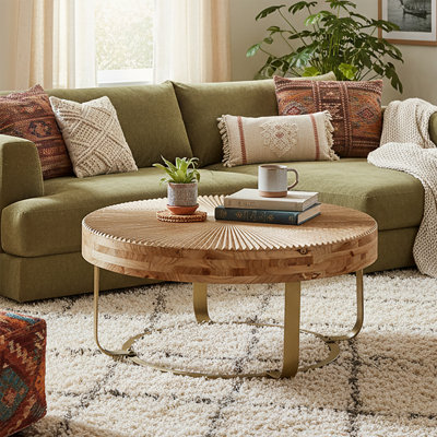 Modern Boho Round Coffee Table wood coffee table with Sunburst Pattern and Metal Base by George Oliver