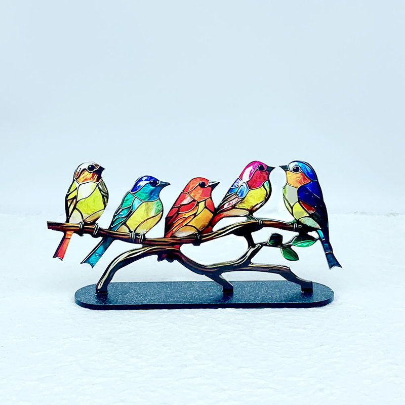 Figurine d'oiseau en acrylique sur une branche