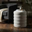 Repose-pieds cylindrique avec rangement, gris clair